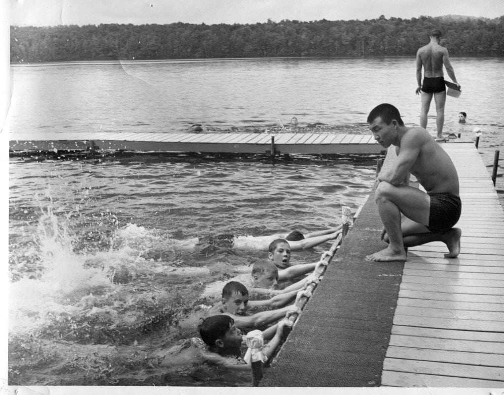 old photo of swimming lessons at Maine camp