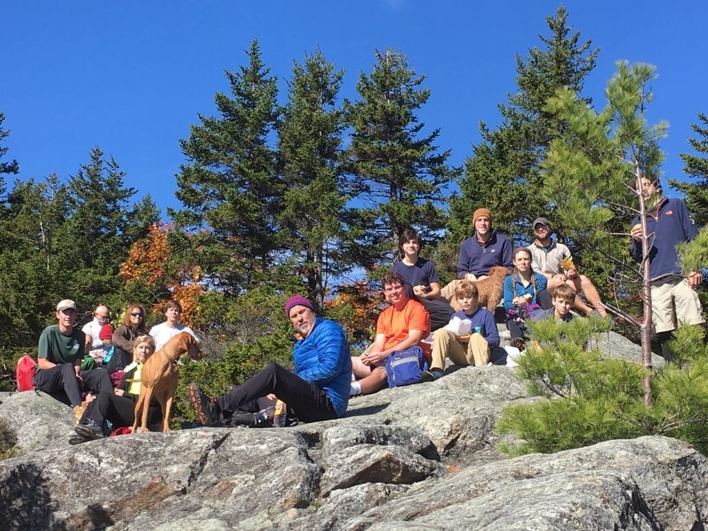 Campers on rocky hill