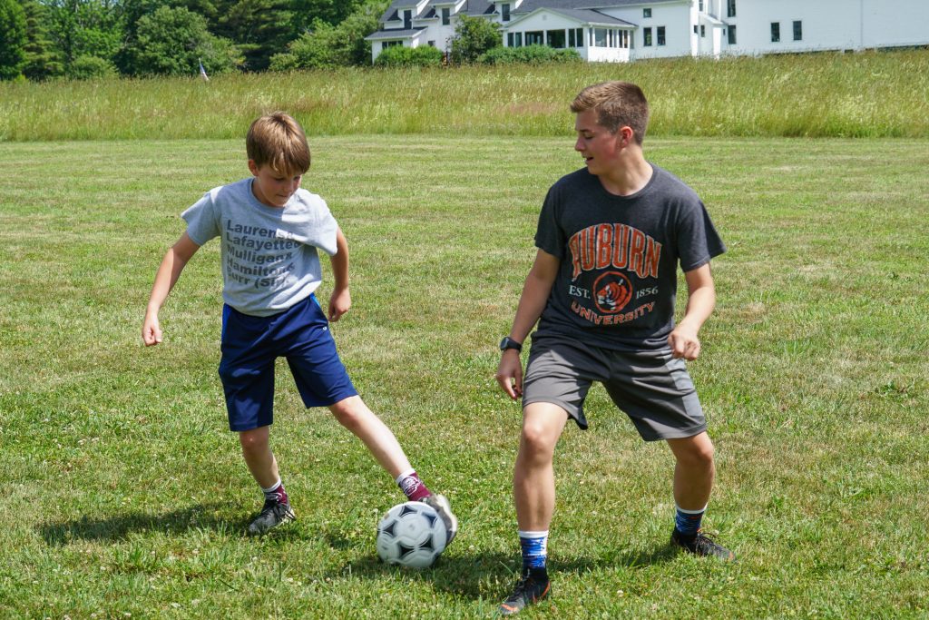 Campers playing soccer