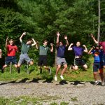 Senior campers jumping