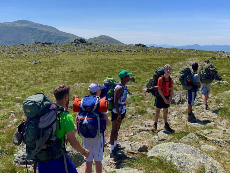 Campers hiking in Maine