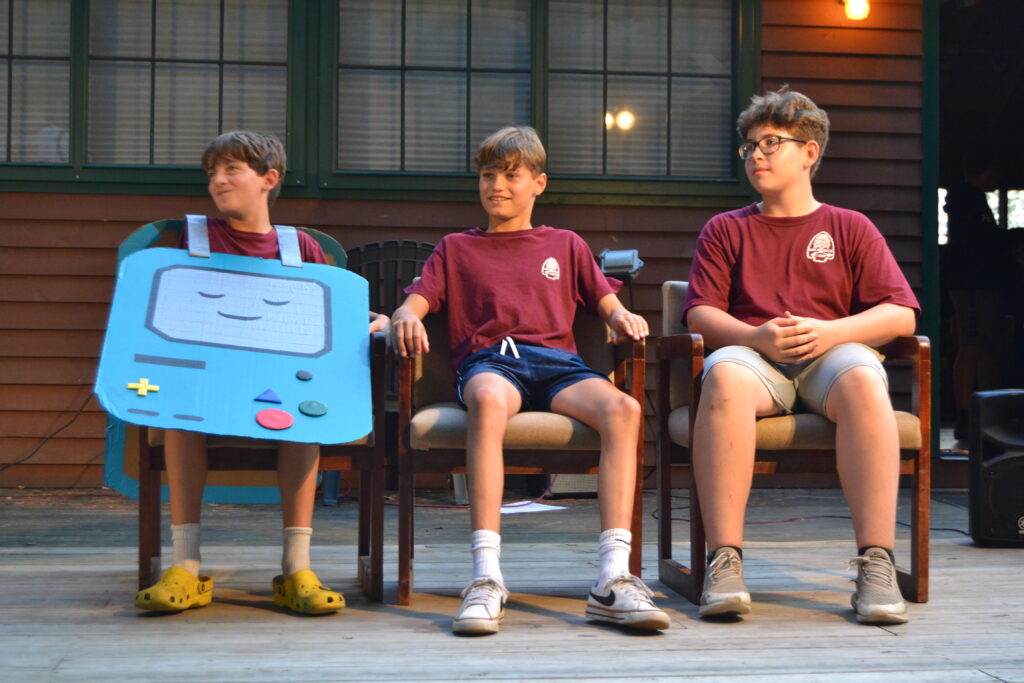 Campers performing a skit at Saturday's campfire.