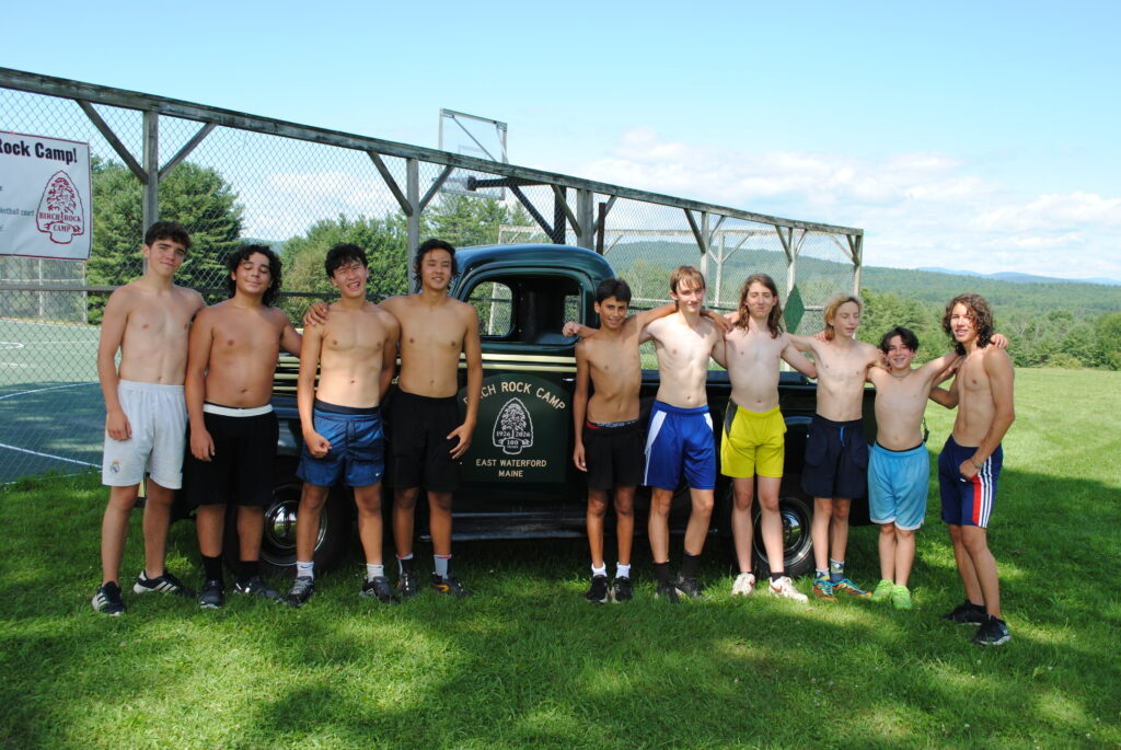 The campers who did the triathlon standing in front of the camp truck.